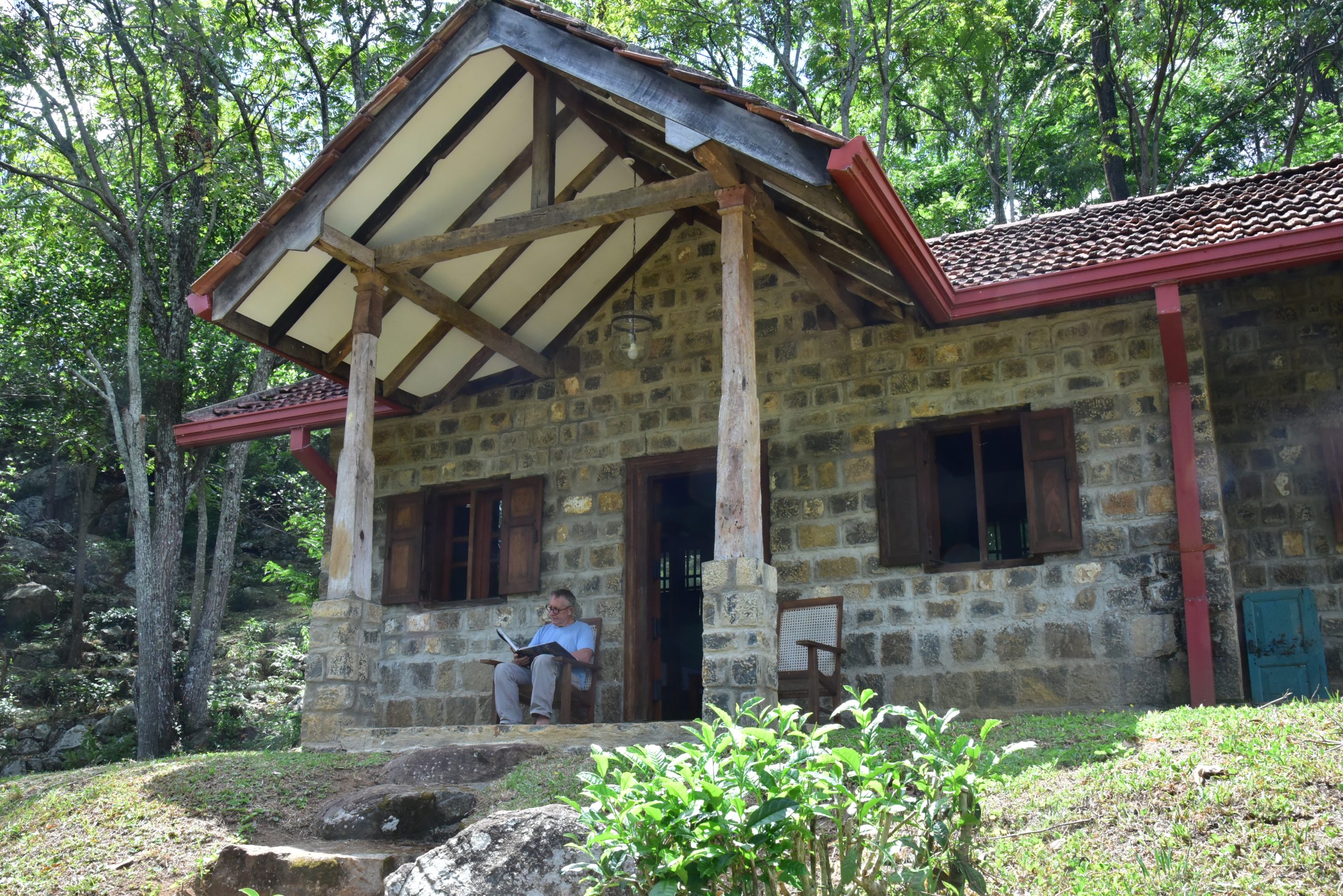 Relaxing in front of Kithul Cottage